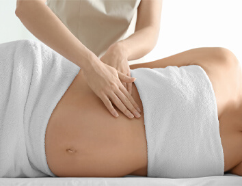 Beneficiile masajului în timpul sarcinii